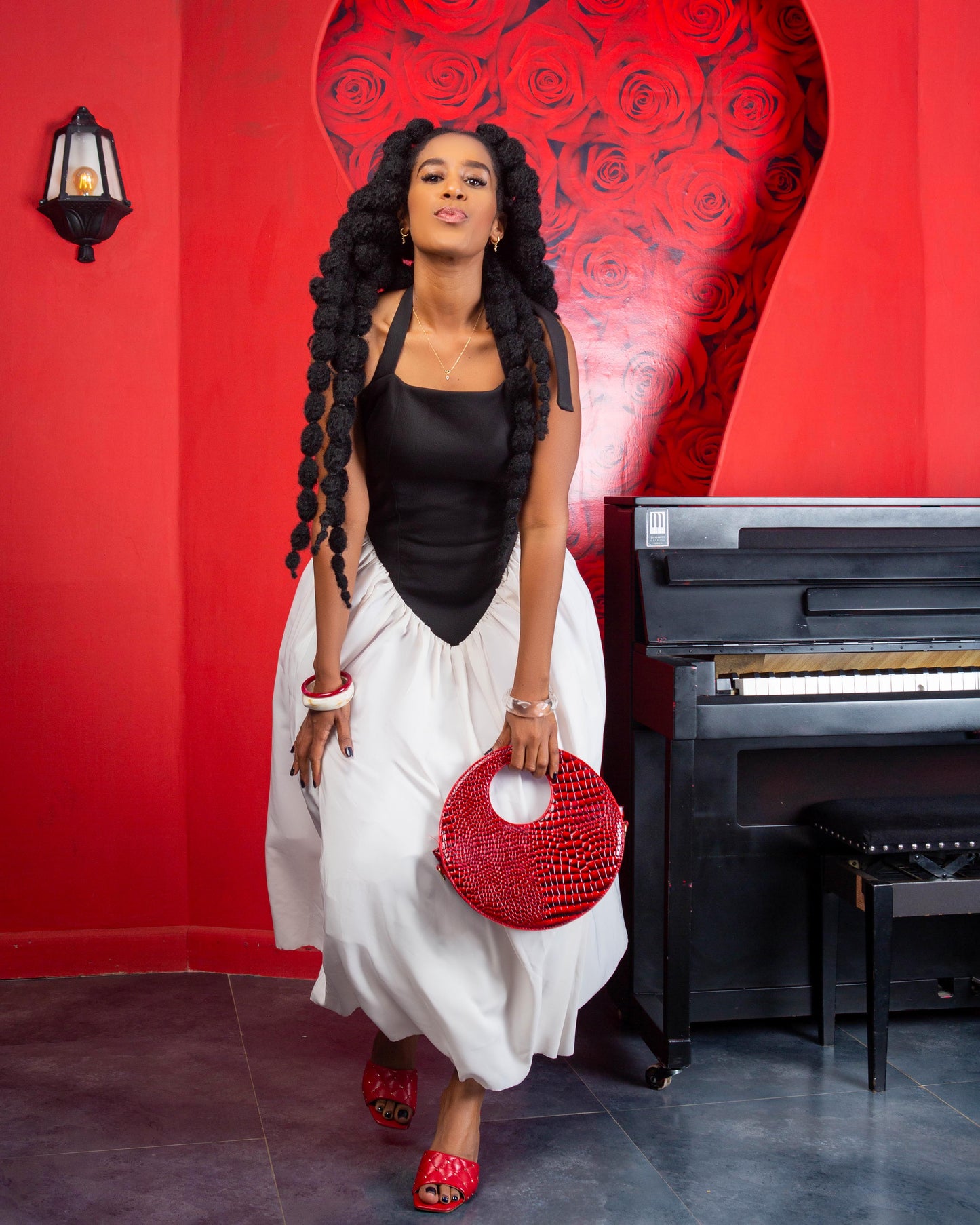 Woman wearing a halter A-line midi dress