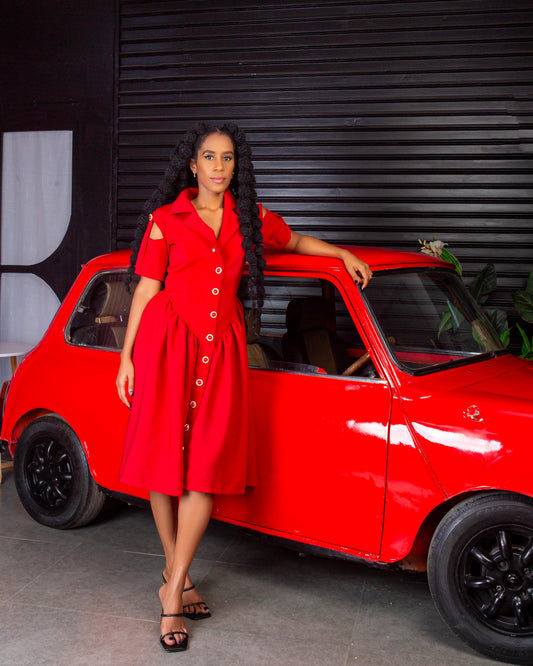 Women wearing a stylish red button down midi dress