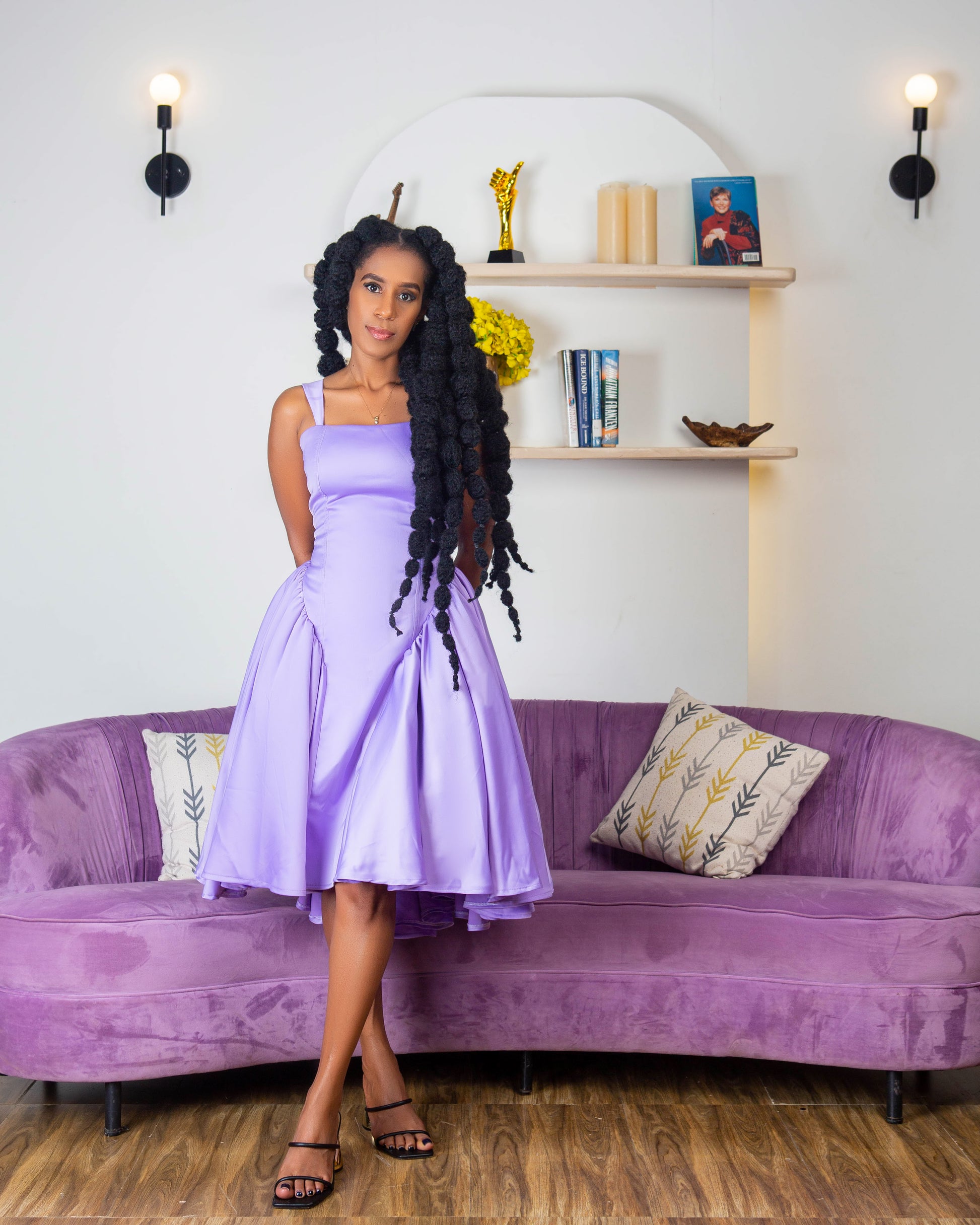 Women wearing a stylish purple halter folds midi dress