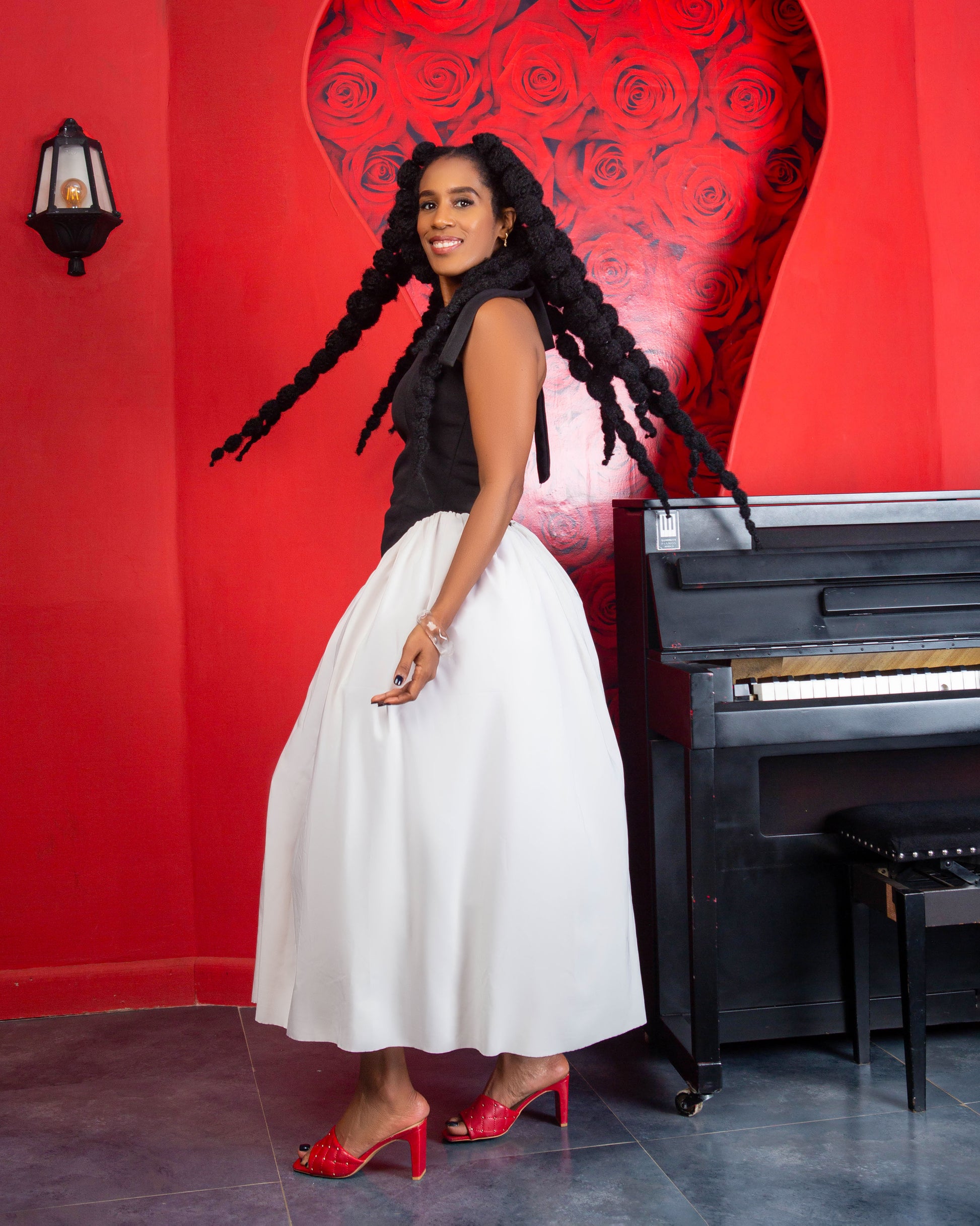 Woman wearing a halter A-line midi dress